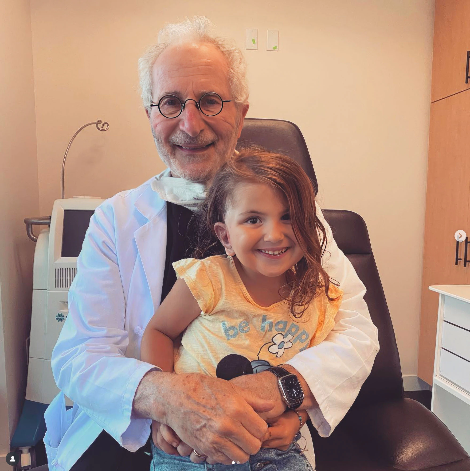 Dr. Reinisch with a pediatric patient