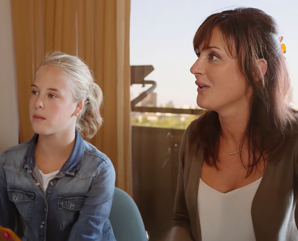 Microtia patient and family during consultation