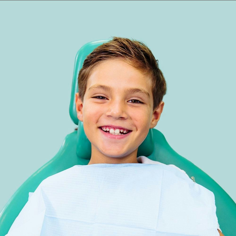Smiling young boy at dentist