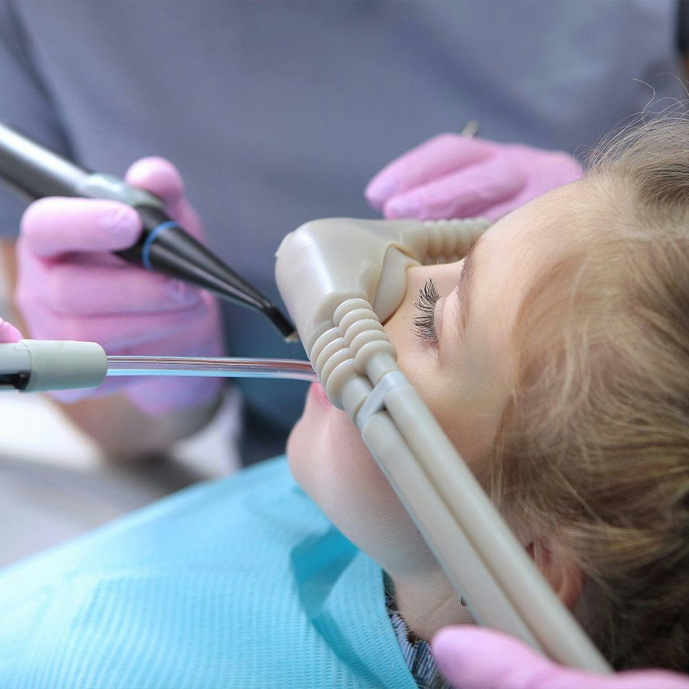 relaxed child receiving dental treatment