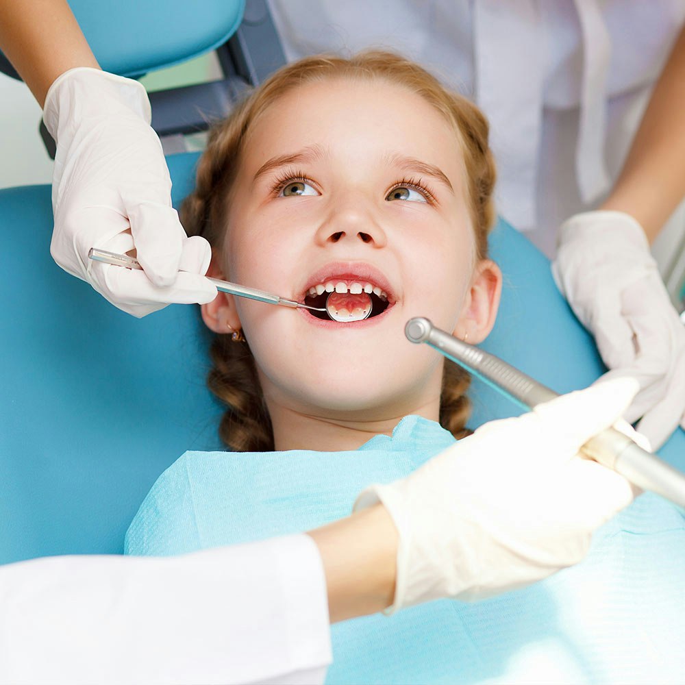 Smiling pediatric dental patient