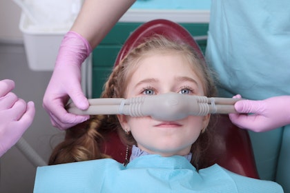 Young girl undergoing nitrous oxide sedation