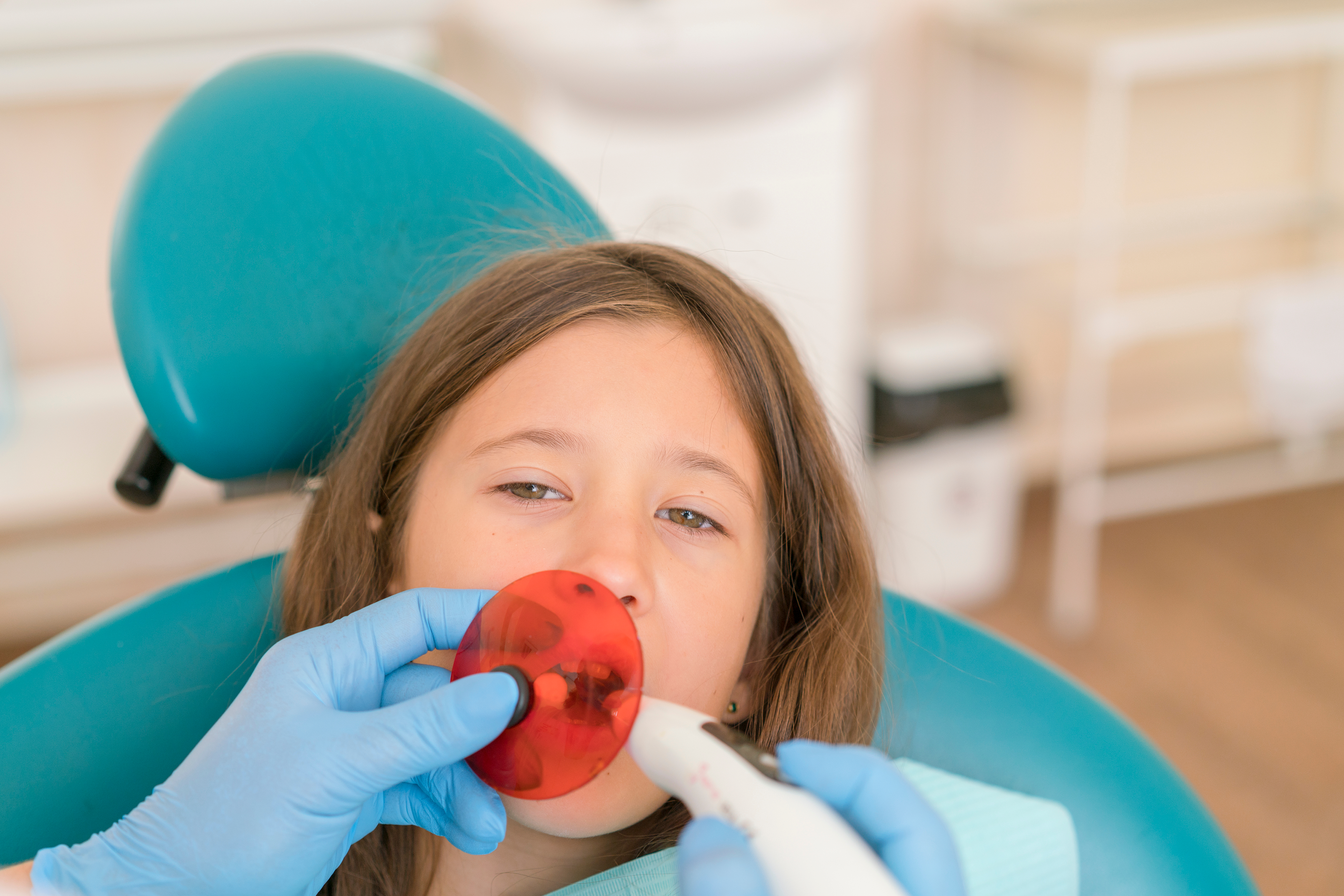 Child getting a dental filling