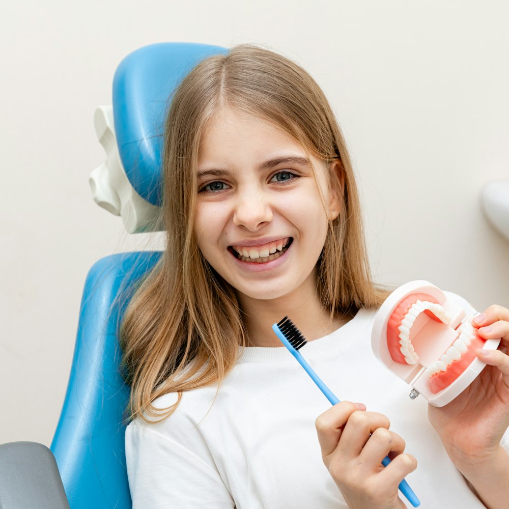 Girl smiling at the dentist