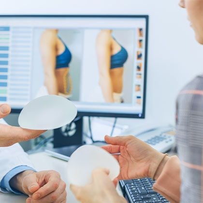 Doctor and patient discussing breast augmentation