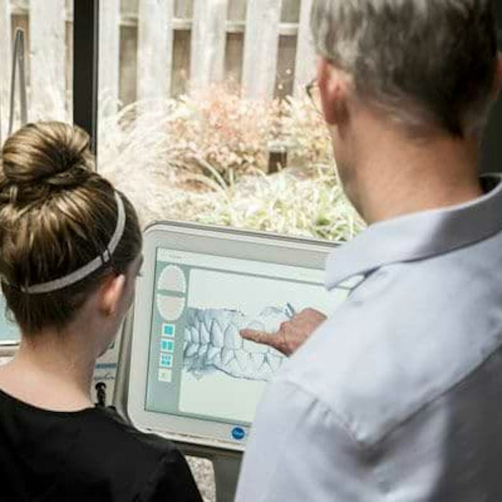 staff viewing itero scanner