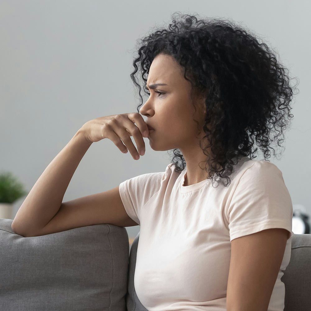 Woman looking off in the distance anxiously