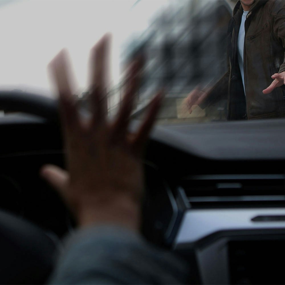 Pedestrian about to be hit by car
