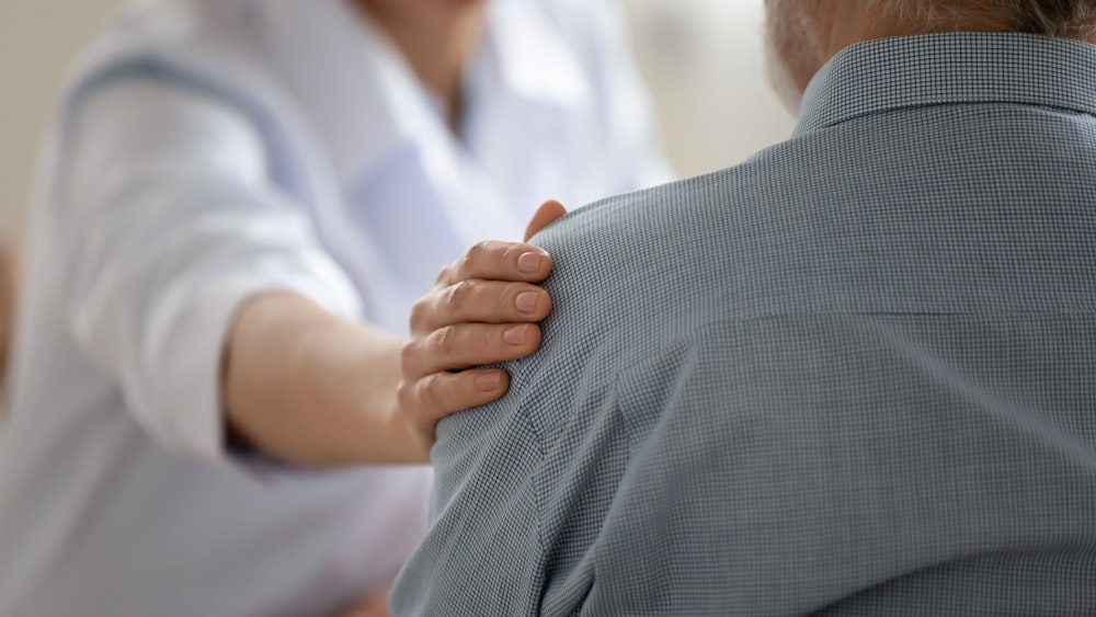 holding hands in reassurance