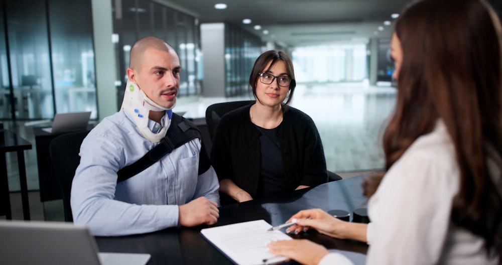 Clients during motorcycle accident law consultation