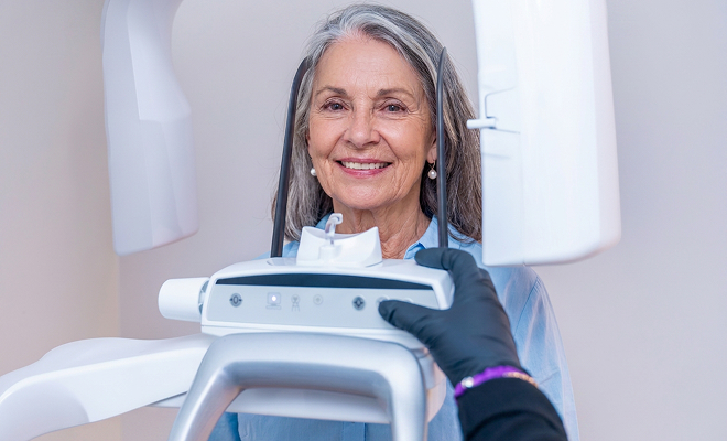 Senior woman getting a dental scan