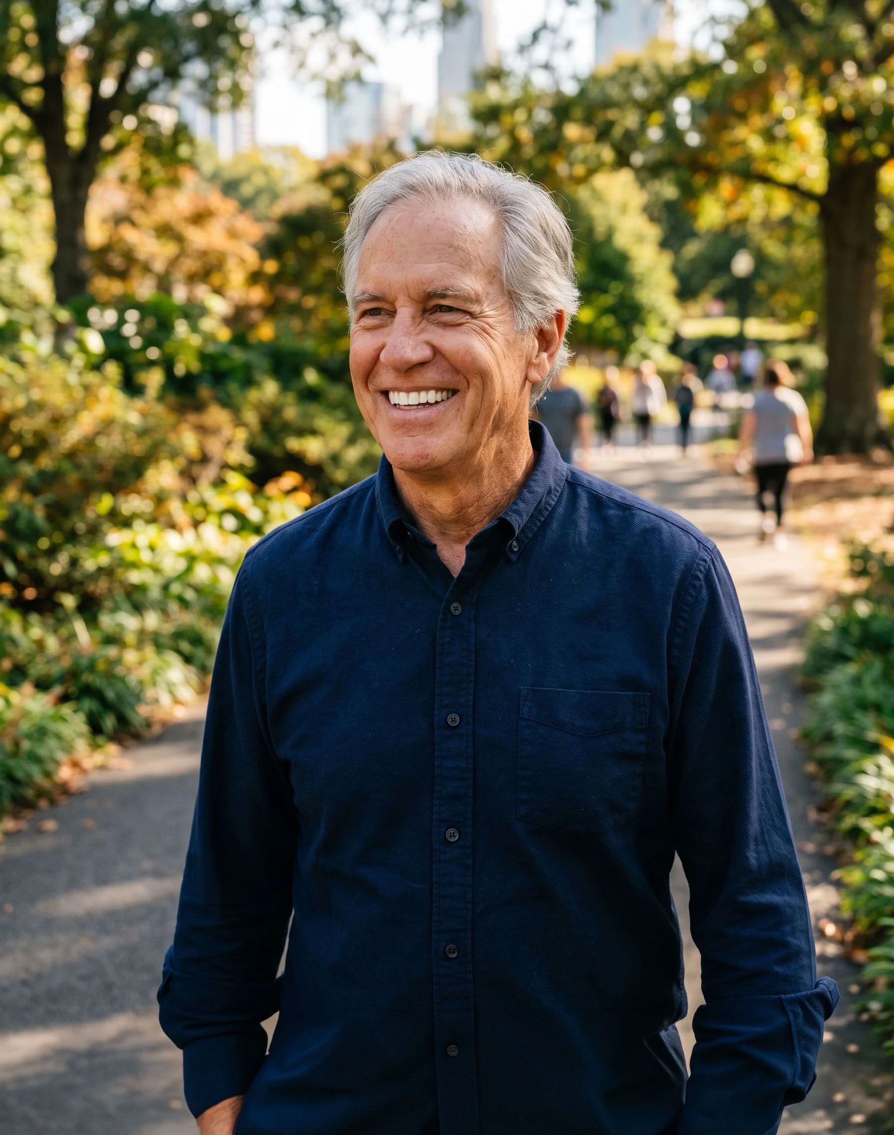 Man smiling in a park