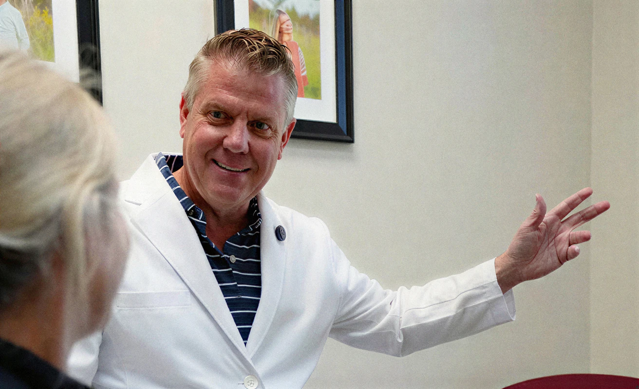 Dr. Pinnix w/ a patient