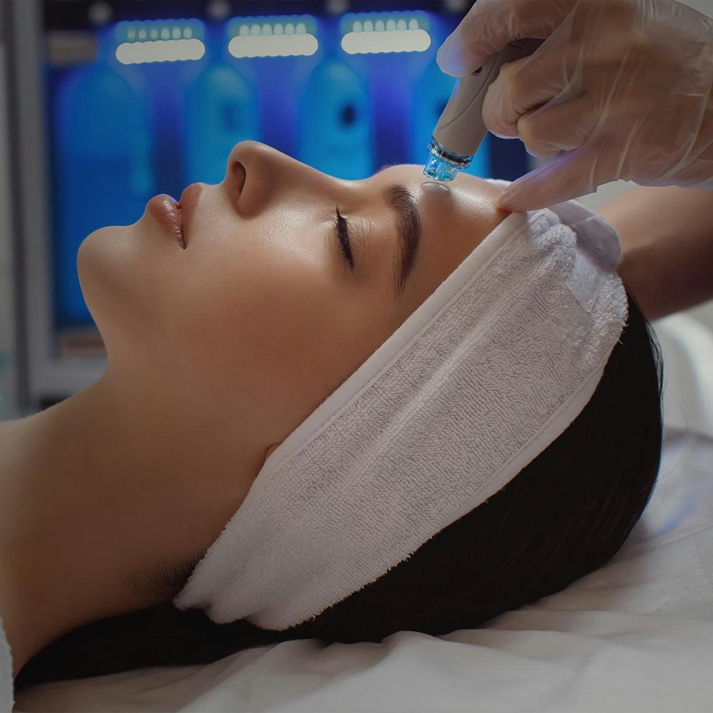 Woman receiving HydraFacial treatment