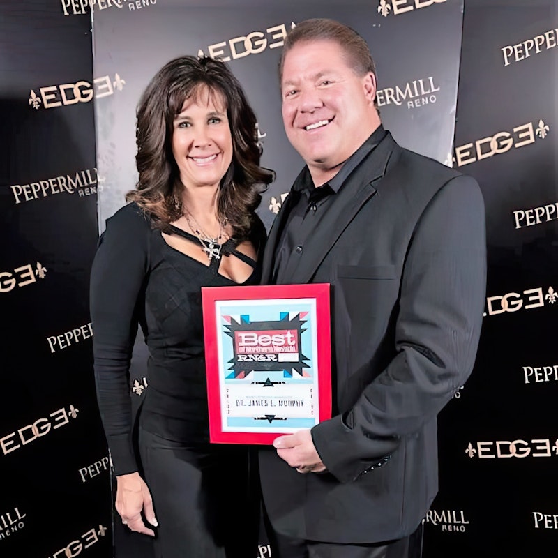 Dr. James E. Murphy receiving an award