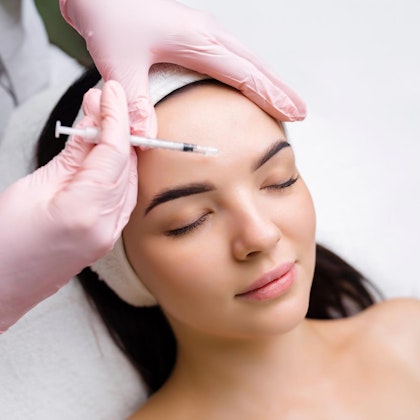 Woman getting BOTOX injection