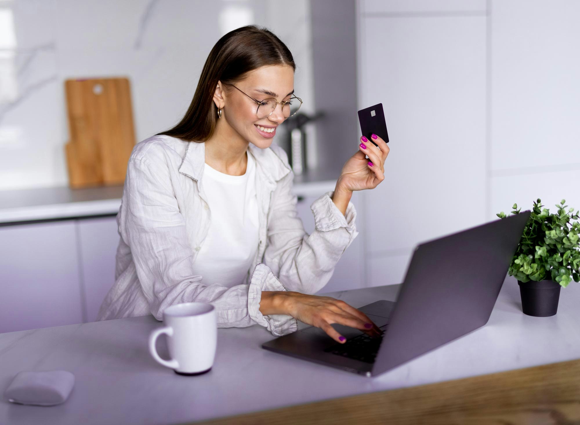 woman paying for med spa services on laptop