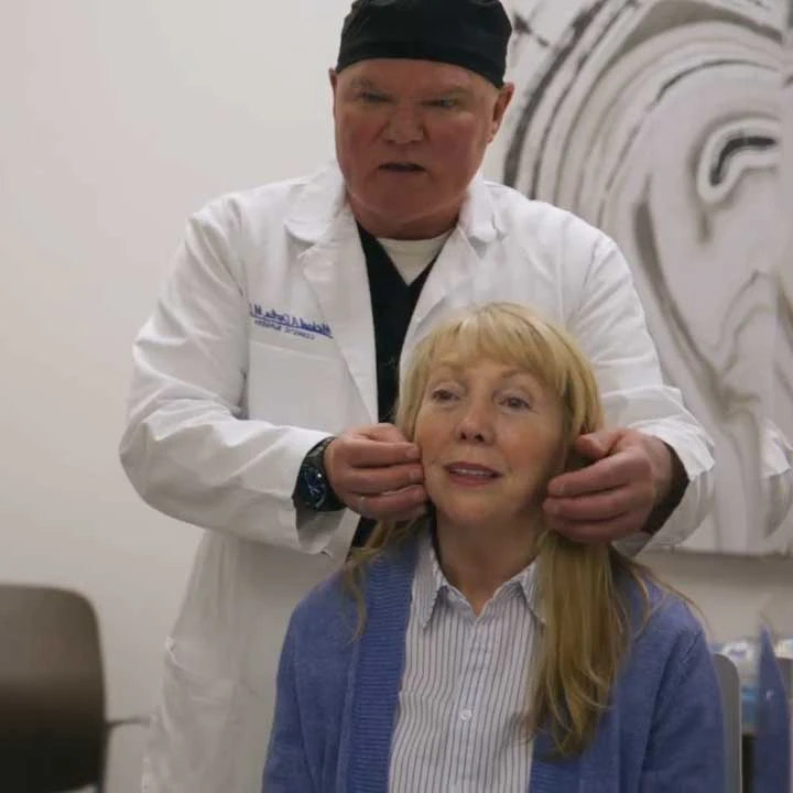 Dr. Devlin consulting with patient