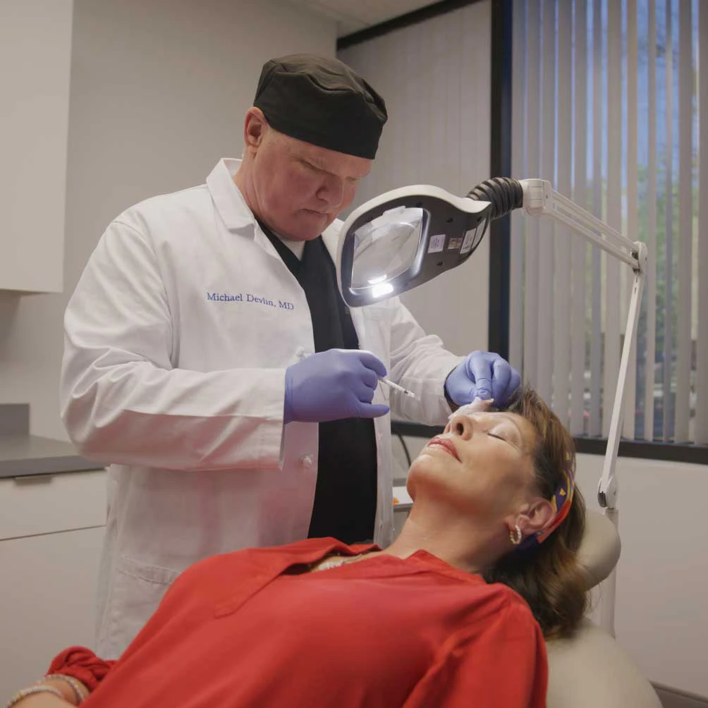 Dr. Devlin performing injections