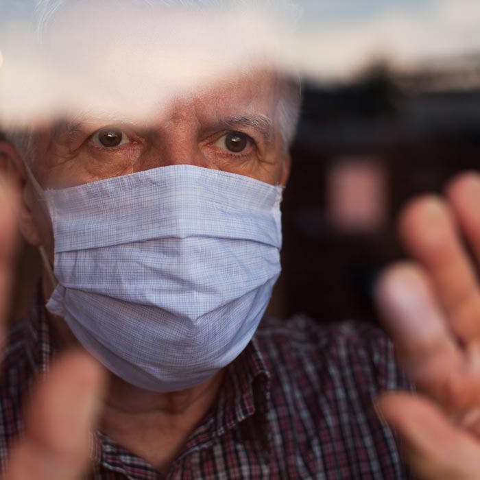 elderly man wearing covid mask