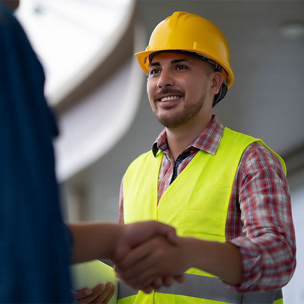Construction lawyer shaking hands with lawyer