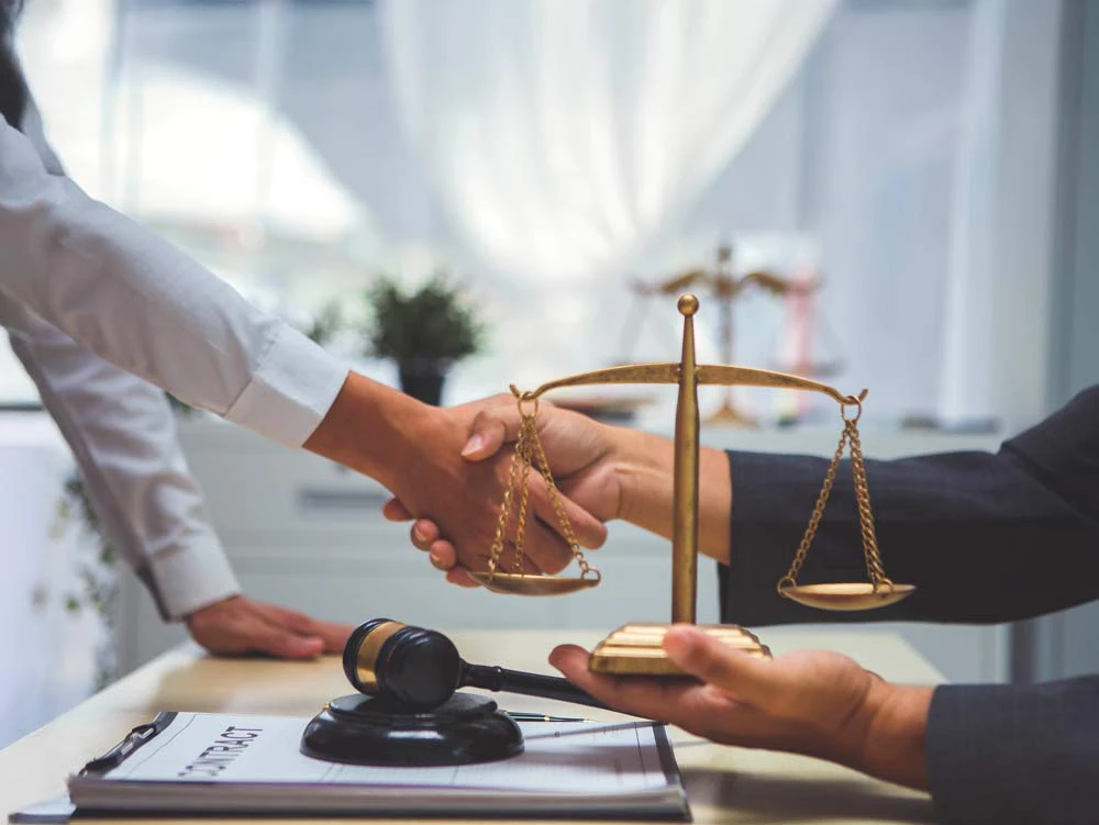 shaking hands in law office
