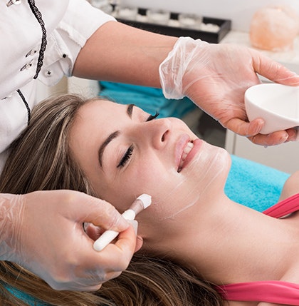 Patient receiving a chemical peel