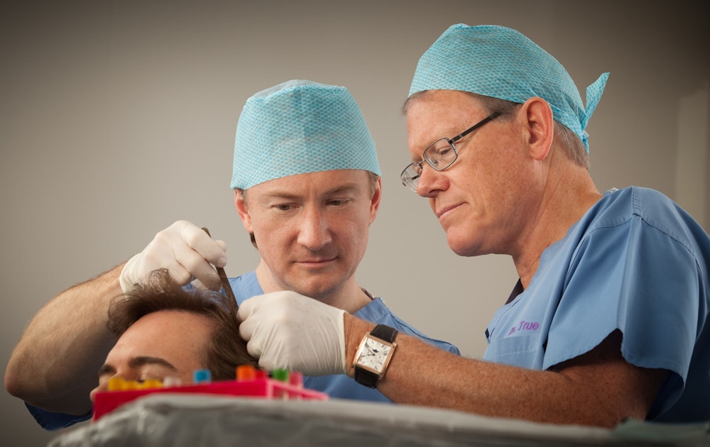 Dr. Dorin looking at patient