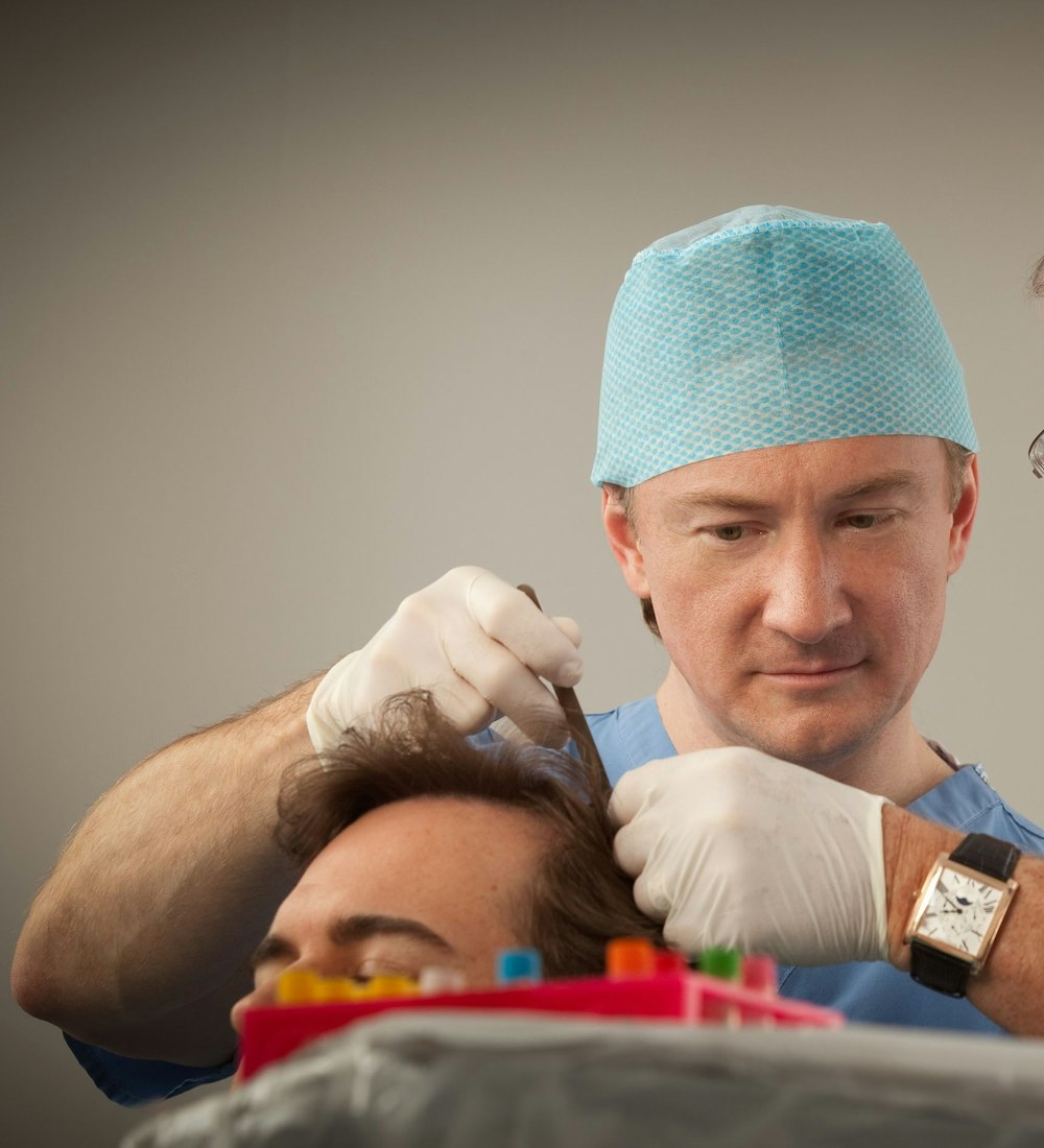 Dr. Dorin looking at patient