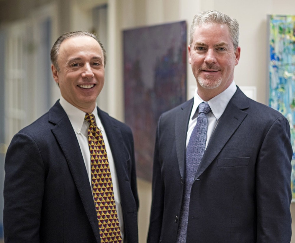 Dr. John Fatse and Dr.  John S. Scovic