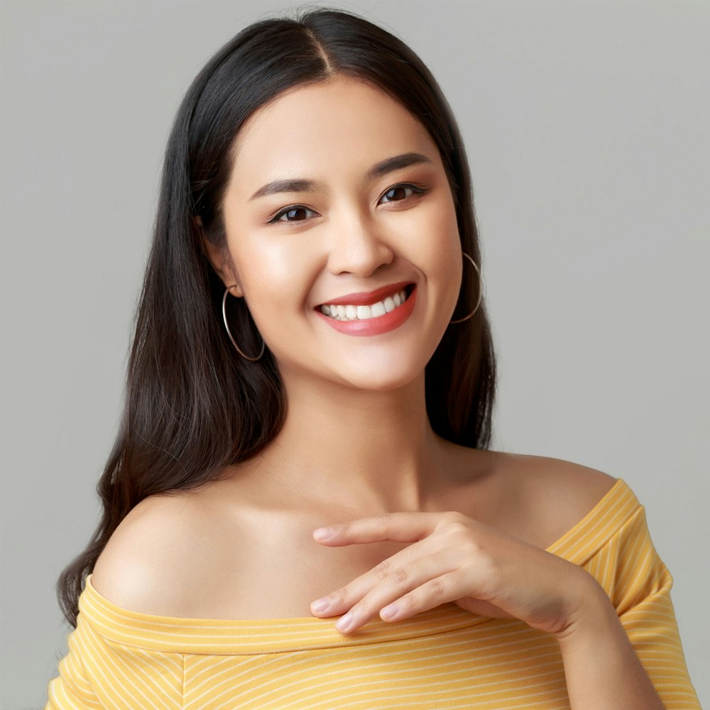 Smiling woman after cosmetic dentistry