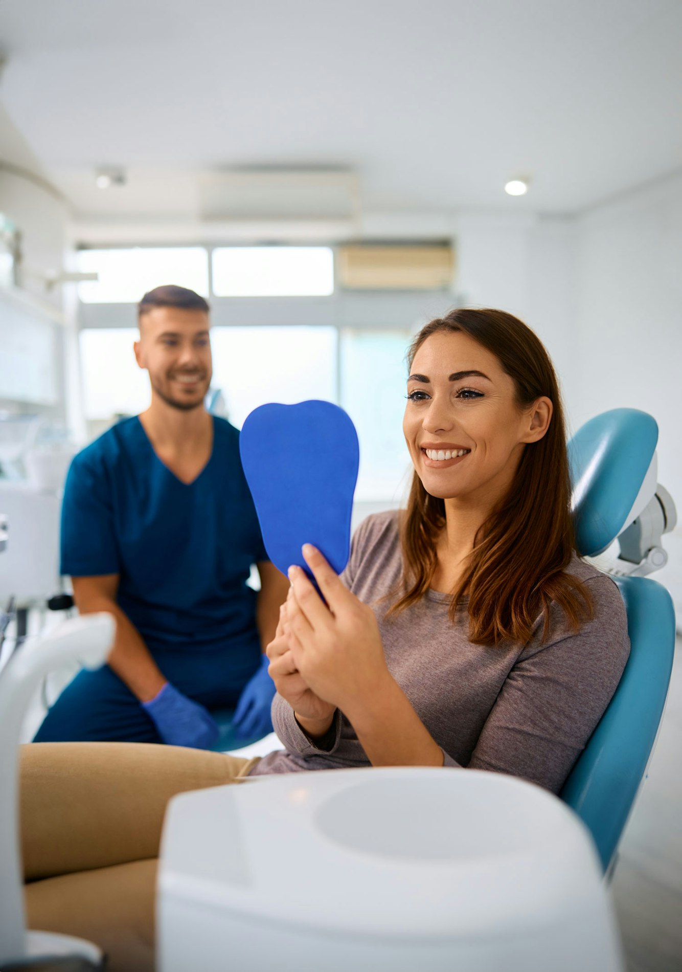 woman smiling at the dentist