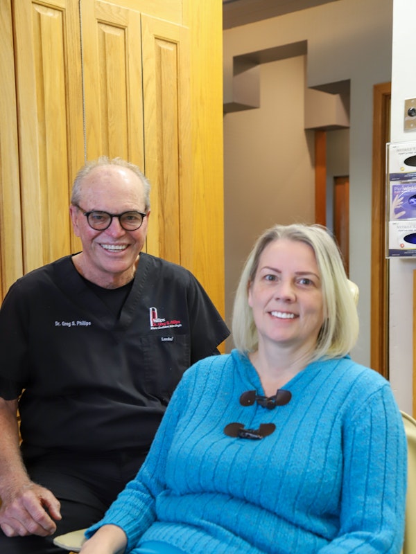 Dr. Phillips with a patient