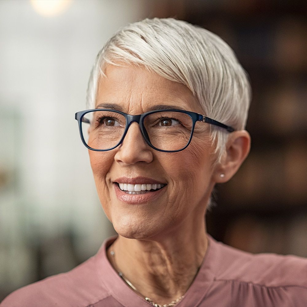 Smiling woman in glasses