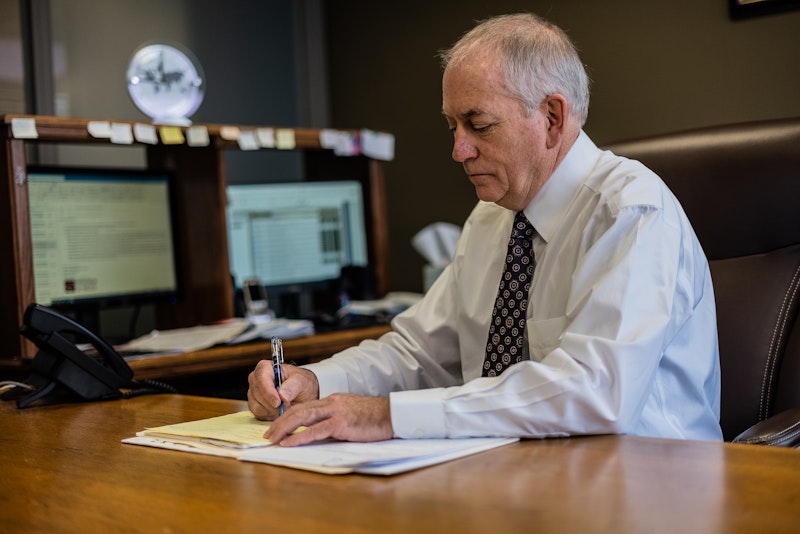 Attorney Robert L. Froerer working on paperwork