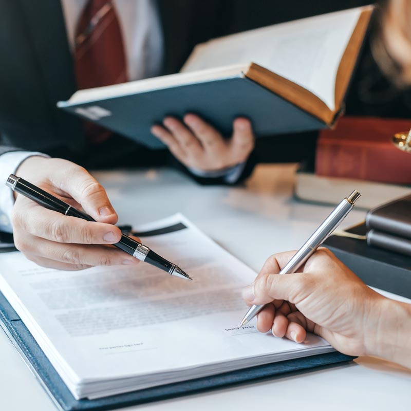 Men Signing Business Contracts