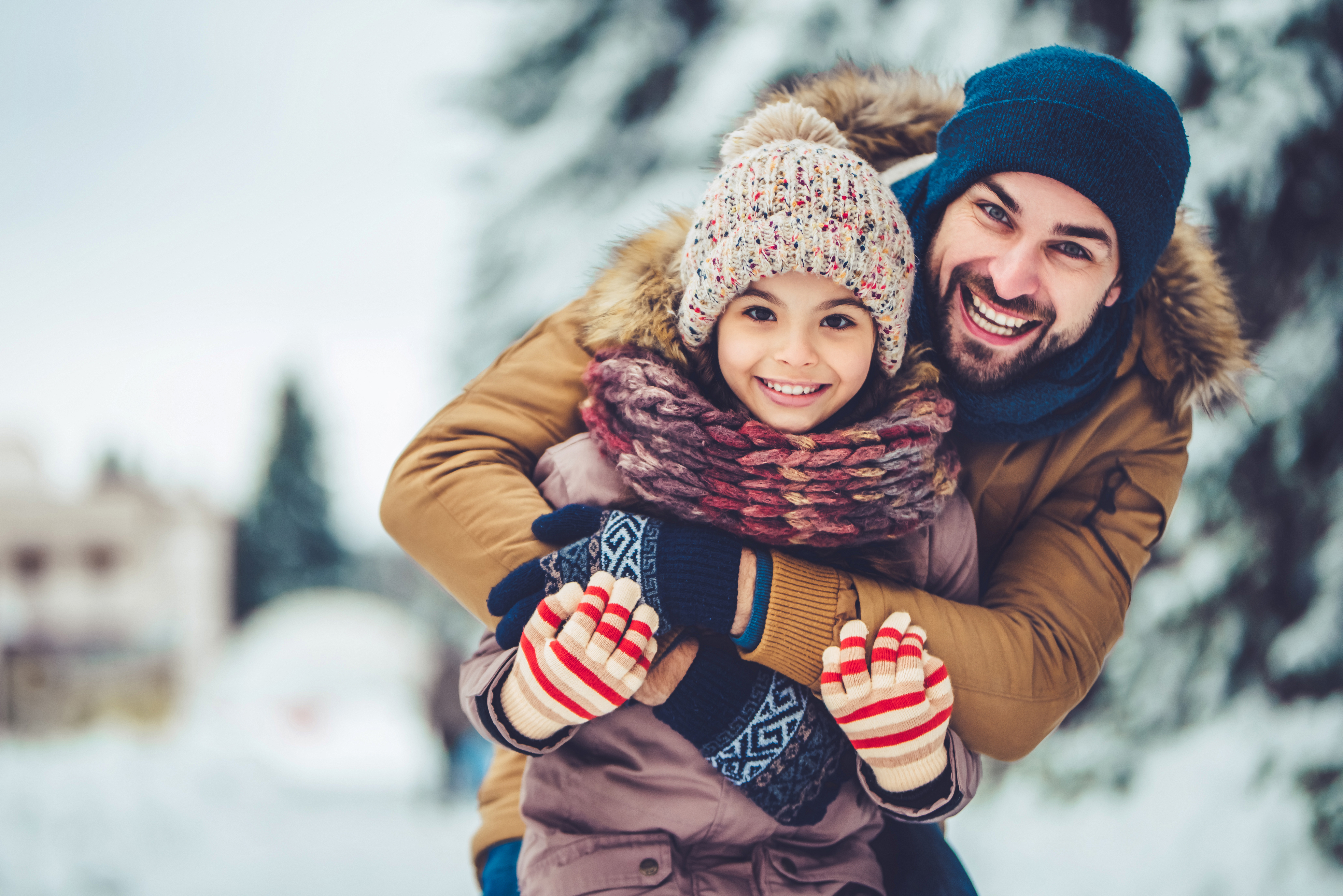 dad and daughter in snow