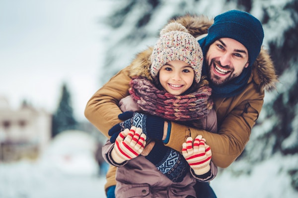 dad and daughter in snow