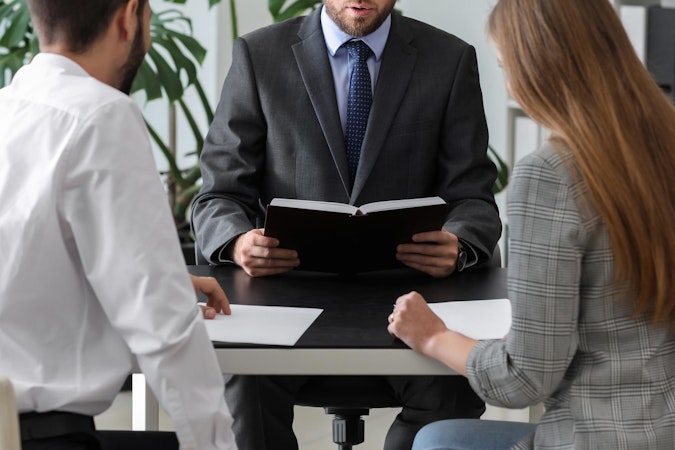 Mother and father meeting with a mediator