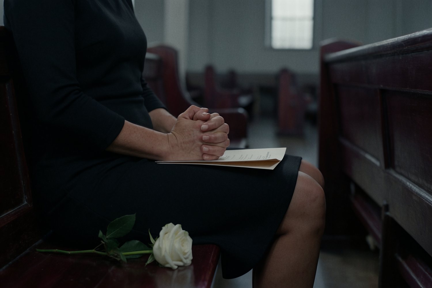 mourners at funeral