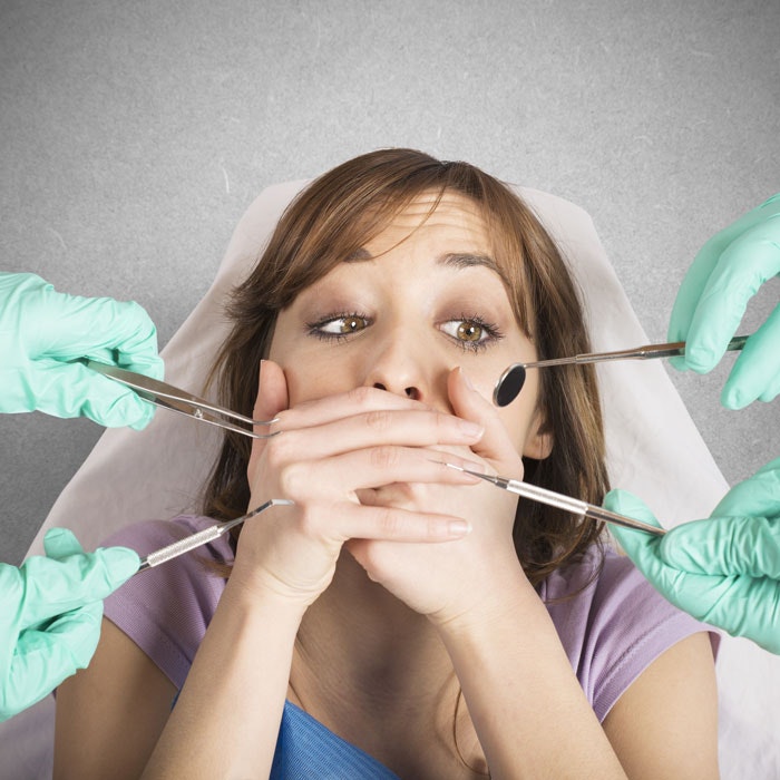Scared patient in dental chair