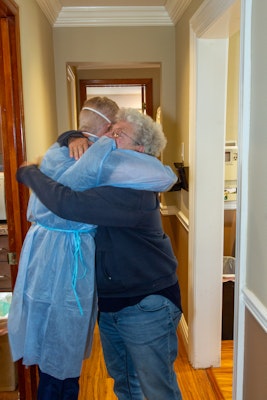 Dr. Mormino hugging a patient