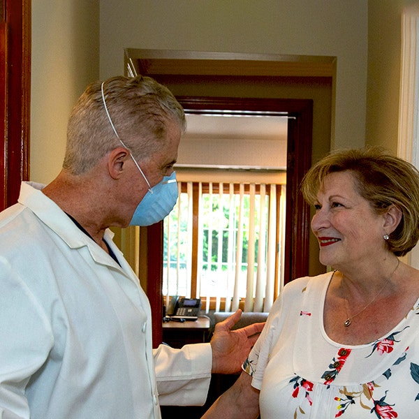 Dentist with patient