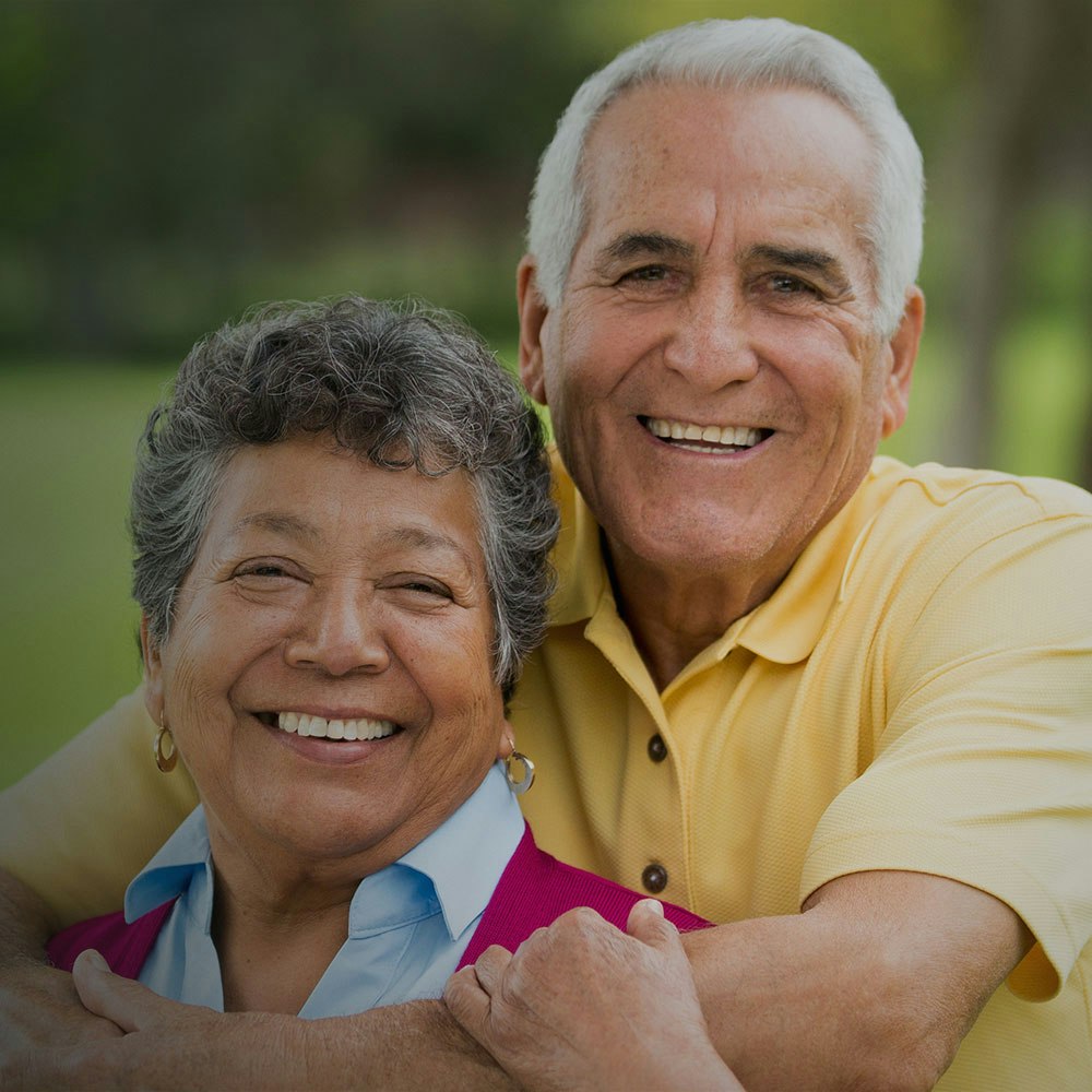 Smiling couple embracing