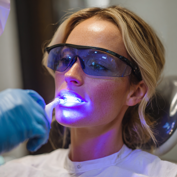 Woman getting a dental bonding treatment
