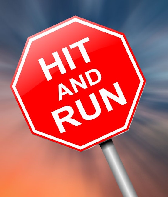 Stop sign with "Hit and Run" printed on it