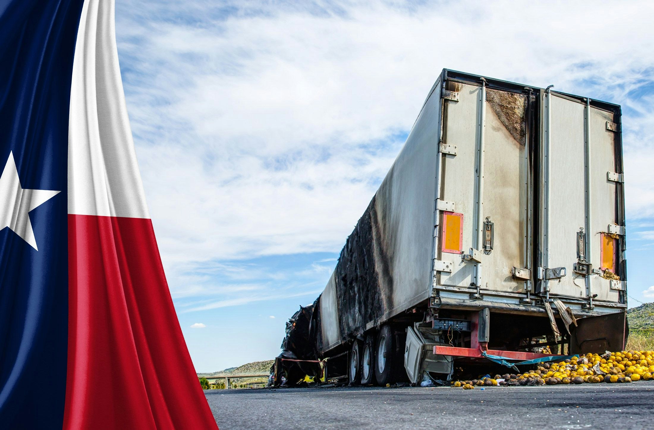 Texas flag and a truck that has been in an accident