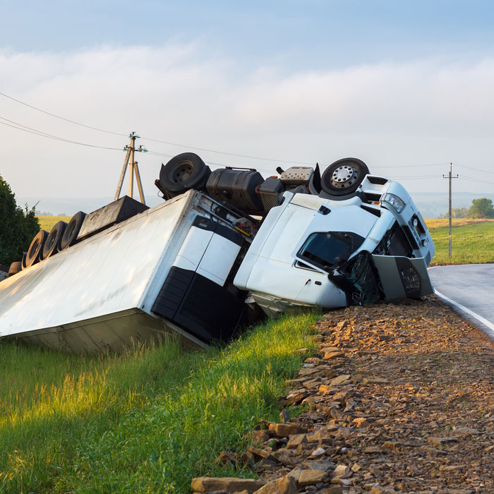 Large commercial truck after a rollover accident