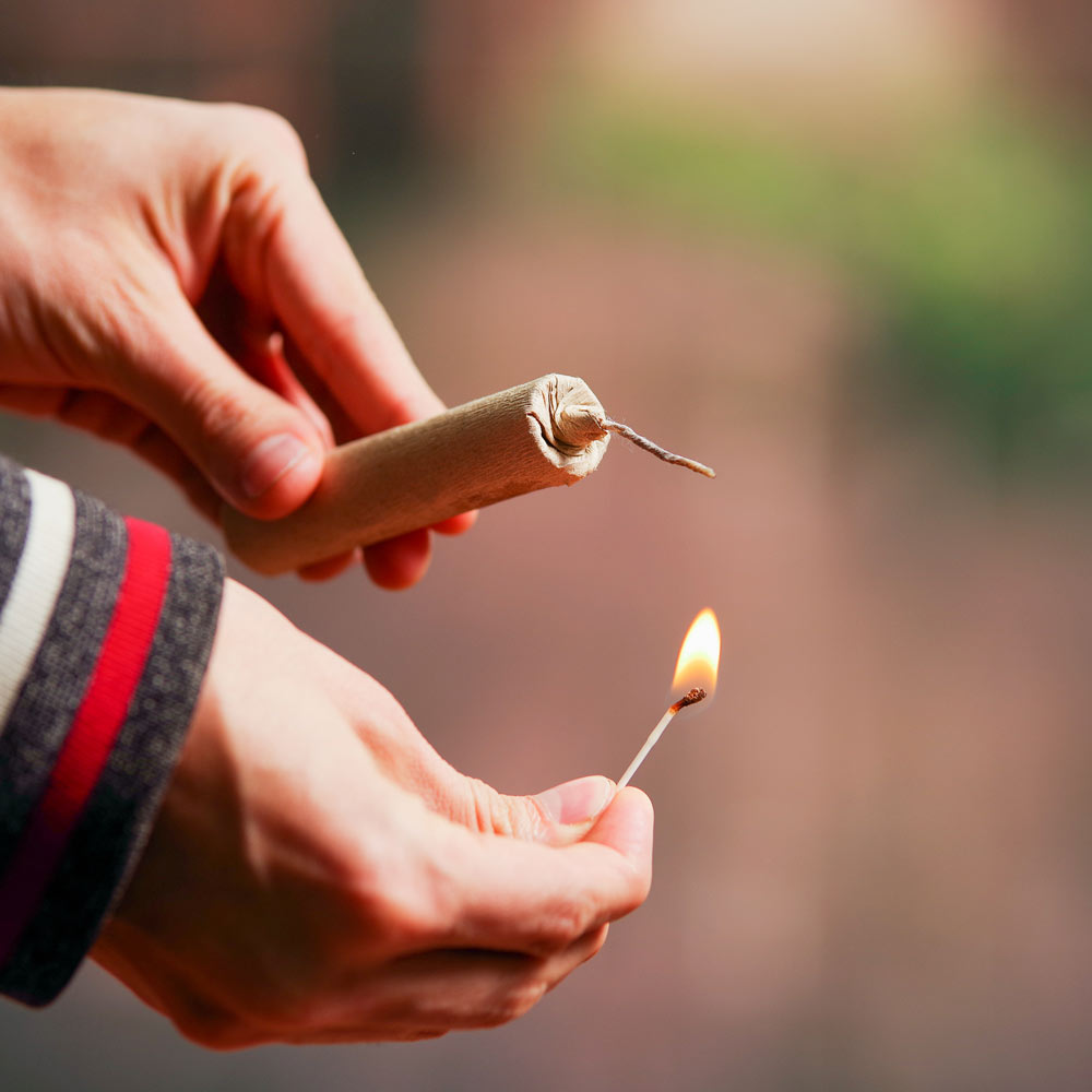 Firecracker about to be lit