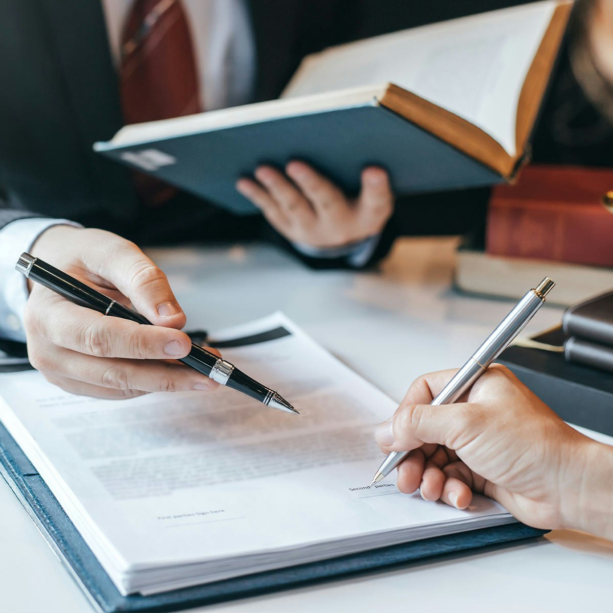 Man signing documents
